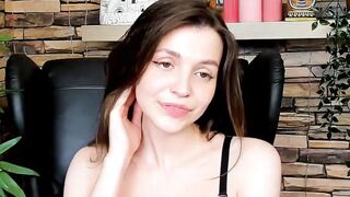 Brown-Haired Babe Masturbates in Front of Camera