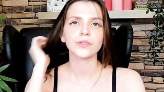 Brown-Haired Babe Masturbates in Front of Camera