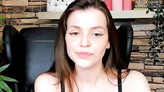 Brown-Haired Babe Masturbates in Front of Camera