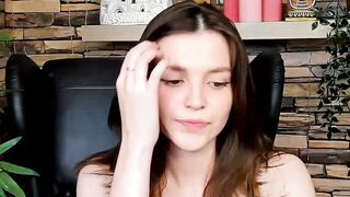 Brown-Haired Babe Masturbates in Front of Camera