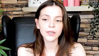 Brown-Haired Babe Masturbates in Front of Camera