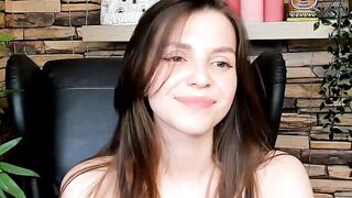 Brown-Haired Babe Masturbates in Front of Camera