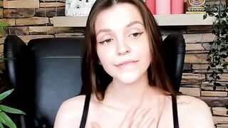 Brown-Haired Babe Masturbates in Front of Camera