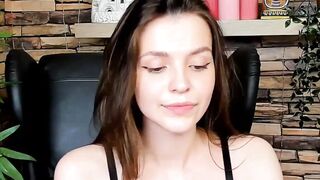 Brown-Haired Babe Masturbates in Front of Camera