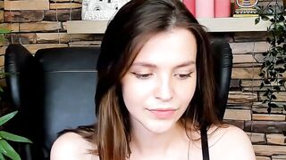 Brown-Haired Babe Masturbates in Front of Camera