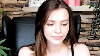 Brown-Haired Babe Masturbates in Front of Camera