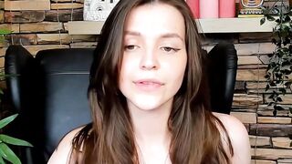 Brown-Haired Babe Masturbates in Front of Camera