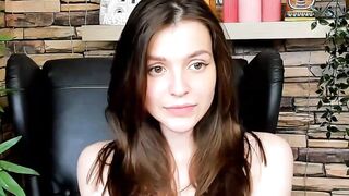 Brown-Haired Babe Masturbates in Front of Camera