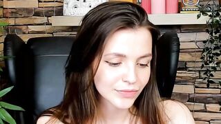 Brown-Haired Babe Masturbates in Front of Camera
