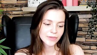 Brown-Haired Babe Masturbates in Front of Camera