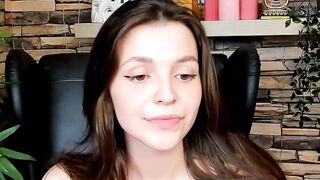 Brown-Haired Babe Masturbates in Front of Camera