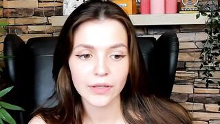 Brown-Haired Babe Masturbates in Front of Camera