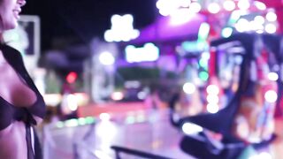 Elle Walks Naked in Public with Her Big Boobs on Display" (French to English Translation)