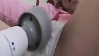 Asian Cutie Uses Her Magic Wand to Achieve Multiple Mind-Blowing Orgasms
