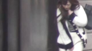 Public-Restrooms-Sexual-Encounter" or "Japanese_Ladies\_Queeferata", both are creative ways to describe this unique scenario of an intimate moment happening inside a bathroom stall while others wait
