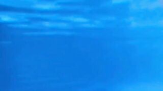 Teacher with Moisa Robert on summer vacation at the pool and the teacher tells moisa