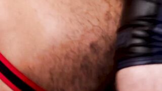 Jayson Parker runs his lubed fist and pierced cock over Pup Hades hole