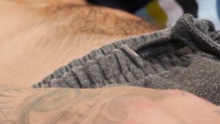 Bearded Alan Davis teases and jacks his monster dick on the couch