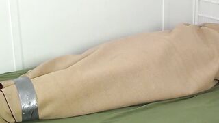 Mature master tickles feet and body of a bound slave hunk