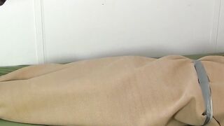 Mature master tickles feet and body of a bound slave hunk