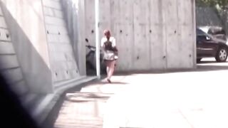 Voyeur films these Asian women making a puddle in the public park