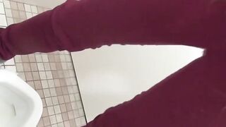 Pervy video of young Japanese girls peeing in a public toilet