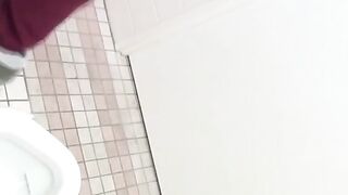 Pervy video of young Japanese girls peeing in a public toilet
