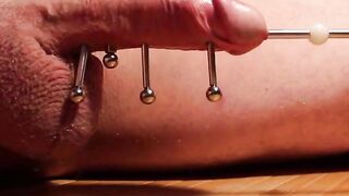 Metal Rod Inserted into Big Cock with Magnets for Kinky Fun