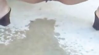 Outdoor Fun: Slave's Pussy Play and Urination