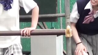 Japanese teen schoolgirls play and pee together outdoors