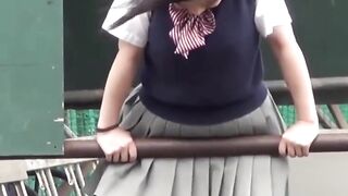 Japanese teen schoolgirls play and pee together outdoors