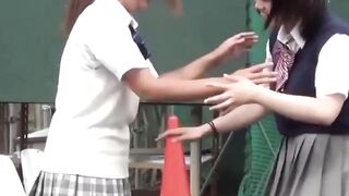 Japanese teen schoolgirls play and pee together outdoors