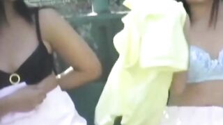 Voyeur films two tennis babes dressing after a sweaty match