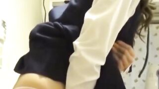 Japanese girl grinds pussy frantically on a kitchen chair