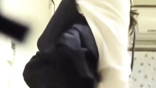 Japanese girl grinds pussy frantically on a kitchen chair