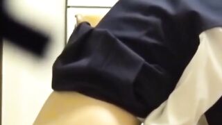 Japanese girl grinds pussy frantically on a kitchen chair