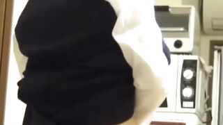 Japanese girl grinds pussy frantically on a kitchen chair