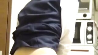 Japanese girl grinds pussy frantically on a kitchen chair