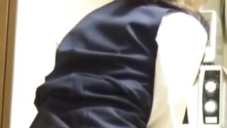 Japanese girl grinds pussy frantically on a kitchen chair
