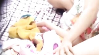 Solo Japanese hottie caught fingering tight pussy for fun