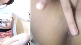 Japanese babe in toilet plunges fingers deep in twat