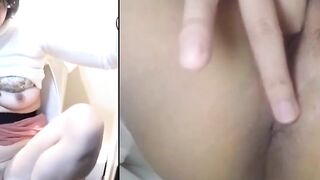 Japanese babe in toilet plunges fingers deep in twat