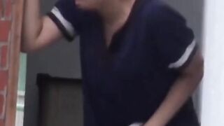 Voyeur snares Japanese chicks pissing in a public park