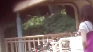 Voyeur snares Japanese chicks pissing in a public park