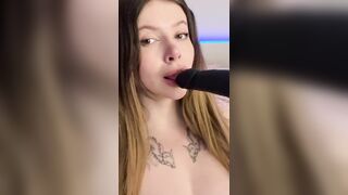Adrianna Savu sucks a thick dark-hued dildo, delivering the hottest XXX!