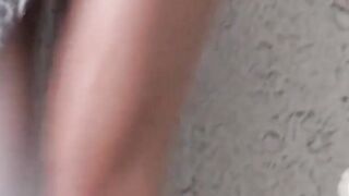 Voyeur cam catches Asian hottie pissing beside a car