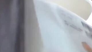 Two Asian babes spread their legs while a cam records secretly