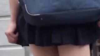 Two Asian babes spread their legs while a cam records secretly