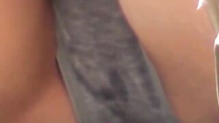 Sporty Japanese babe filmed playing in a tiny short skirt