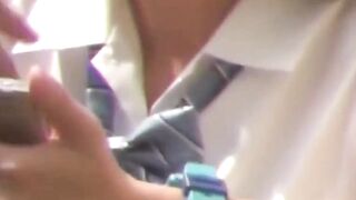 Sporty Japanese babe filmed playing in a tiny short skirt